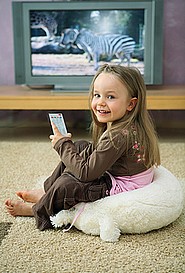 Feeling right at home on her living room carpet.