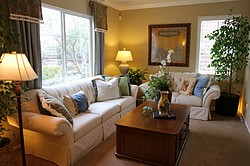 Wall to wall carpeting adds a warm feel to this living room.