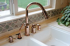 Copper faucet set up with all the extras.