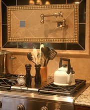 Wall mounted pot filler.